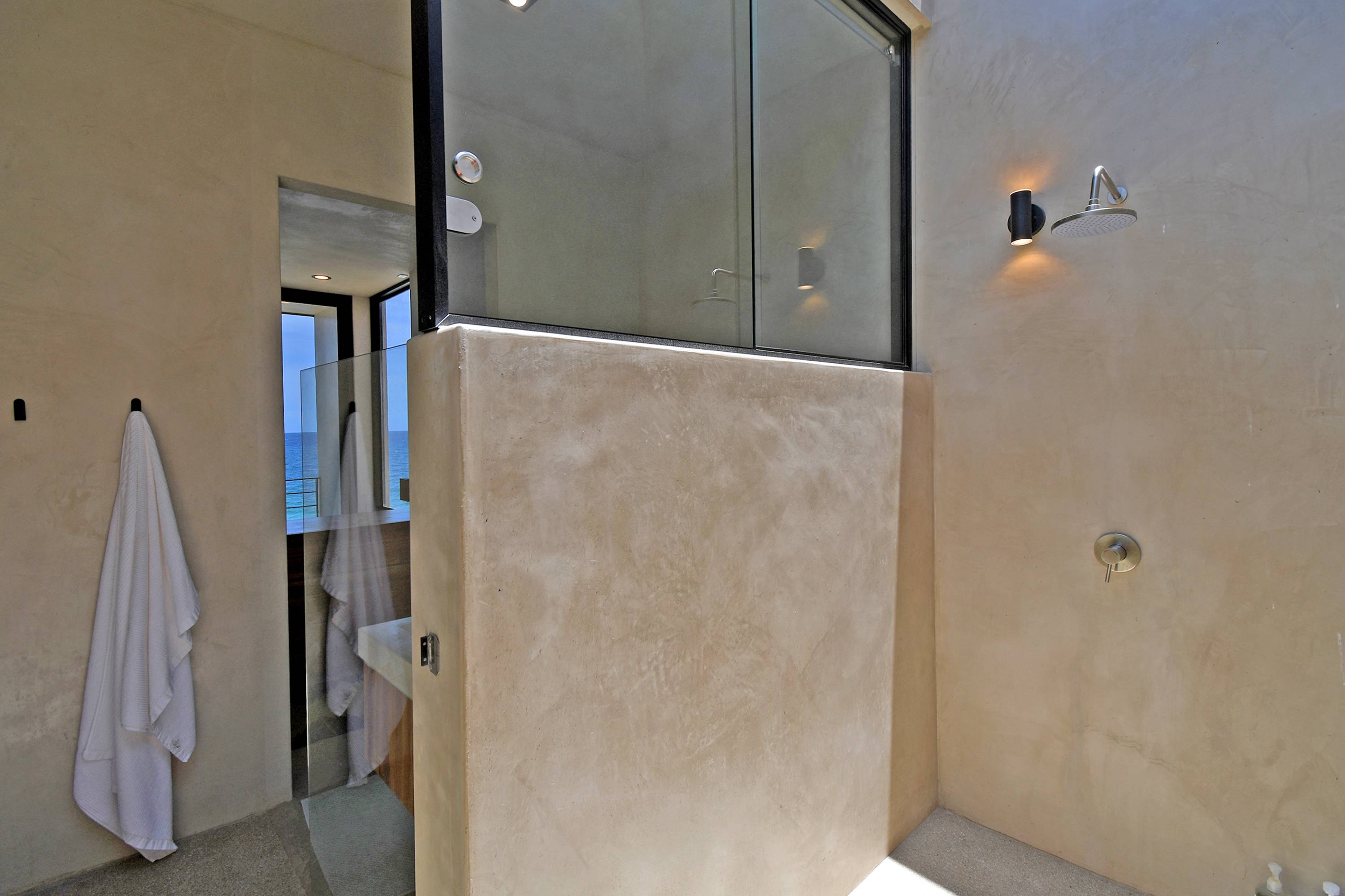 The walled outdoor shower off the master bathroom.